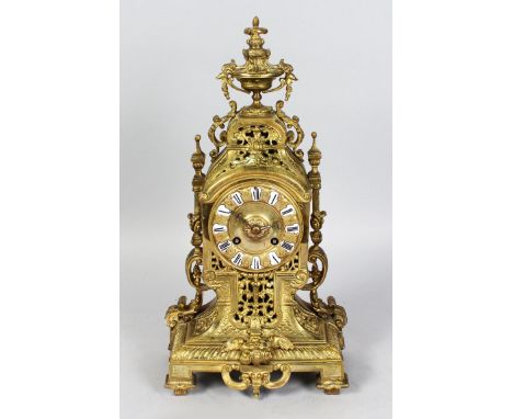 A GOOD 19TH CENTURY FRENCH BRASS MANTLE CLOCK, with black and white enamel Roman numerals, eight-day movement, striking on a 