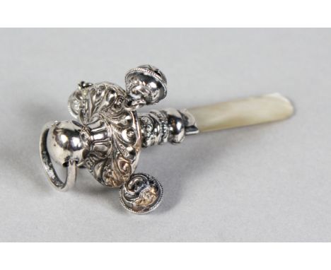 A BABIES SILVER AND MOTHER-OF-PEARL RATTLE.