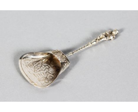 A DUTCH SILVER CADDY SPOON.