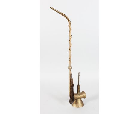 A PAKTONG OPIUM PIPE, with engraved decoration. 20ins high.