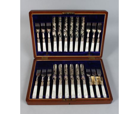 A CASED SET OF TWELVE MOTHER-OF-PEARL HANDLED FRUIT KNIVES AND FORKS.