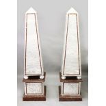 A PAIR OF LARGE INLAID CARRERA MARBLE OBELISKS, raised on plinth and sphere bases. Each 6ft 8ins