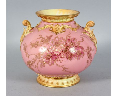A ROYAL WORCESTER PORCELAIN VASE, raised gold enamel on a pink ground, purple stamp base, 8ins high.
