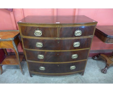 A Regency mahogany and brass inlaid bow front chest of drawers 