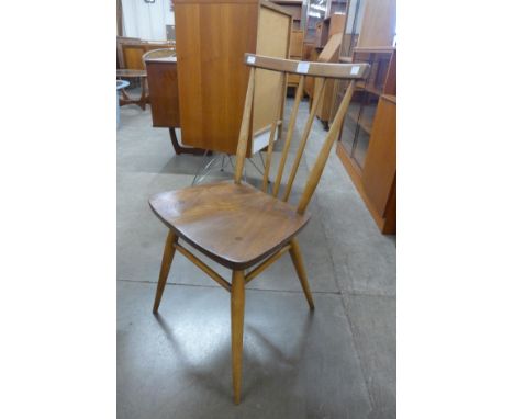 An Ercol Blonde elm and beech 608 model chair 