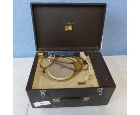 A HMV record player with Bakelite knobs in case 