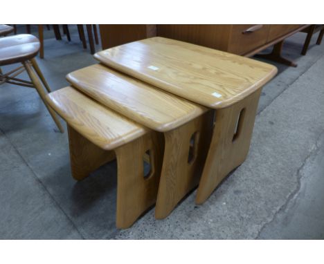 An Ercol Blonde ash nest of tables 