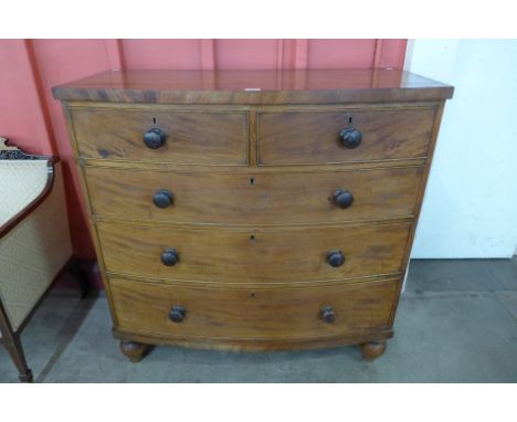 A Victorian mahogany bow front chest of drawers 