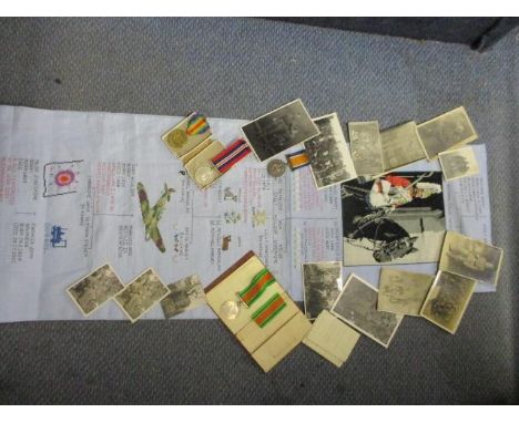 World War I and World War II medals, two inscribed 37544 Pte AF Saunders D of Corn LI related photographs and a family tree t