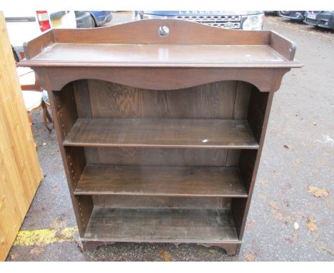 An early 20th century oak three-tier bookcase standing on bracket feet 49"h x 42"w 