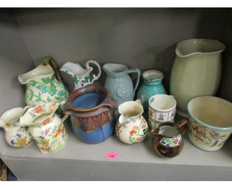 A selection of Victorian and later ceramic jugs, a Wedgwood commemorative mug, a Denby Dansby vase, a Masons jug and others 