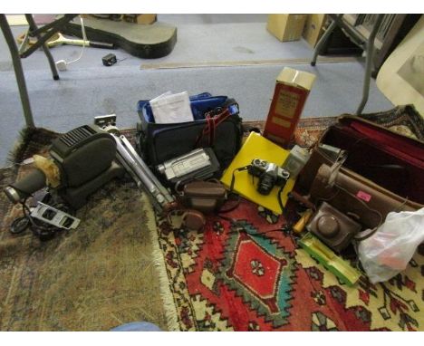 A mixed lot of camera, video and projector equipment to include a vintage Pentax Spotmatic camera, other leather cased camera