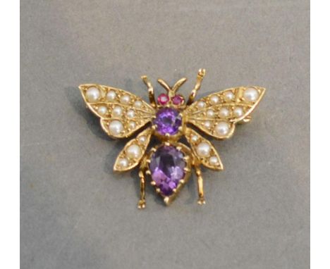 A 9 Carat Gold Small Brooch in the form of a butterfly set amethyst, pearls and rubies, 2.5cm wide 