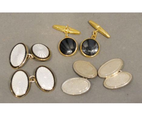 A Pair of Enamel Decorated Cufflinks, together with a similar yellow metal pair of cufflinks and a pair of silver cufflinks 