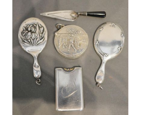 A Sterling Silver Vesta Case of Circular Form, golf related, together with two miniature silver backed hand mirrors, a silver