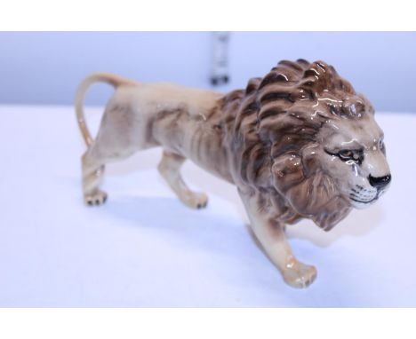 A large Beswick lion 