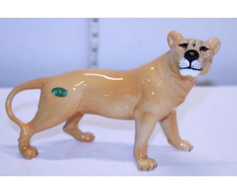 A large Beswick lioness 