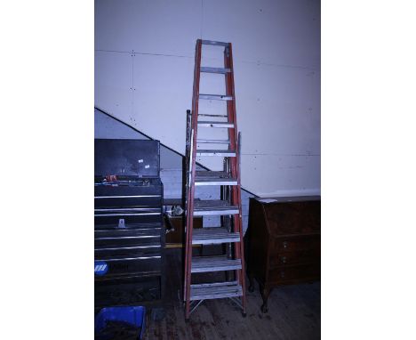 Two metal step ladders. shipping unavailable 
