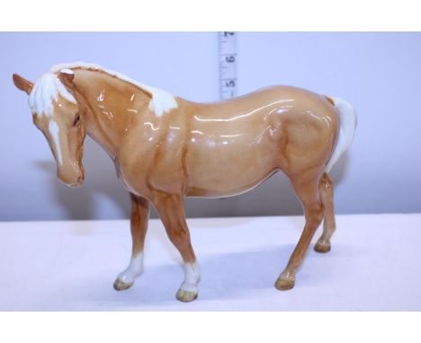 A large Beswick horse (missing one ear) 