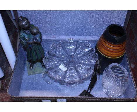 A vintage suitcase and contents, shipping unavailable 