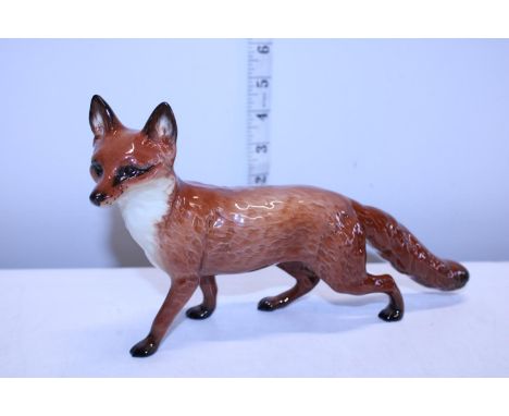 A large Beswick fox 