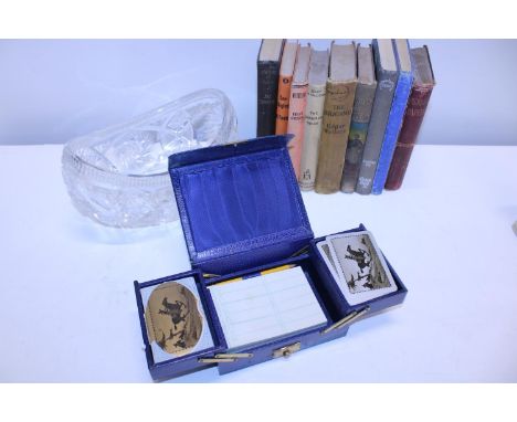 A selection of assorted antique books with a vintage travelling bridge set and a cut glass fruit bowl 