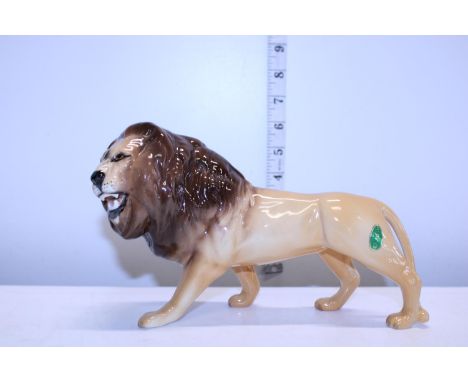 A large Beswick Lion 