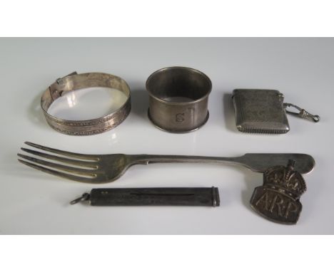 A mixed collection of silver wares, various makers and dates includes fork, napkin ring, bangle etc weighable silver 100gms, 