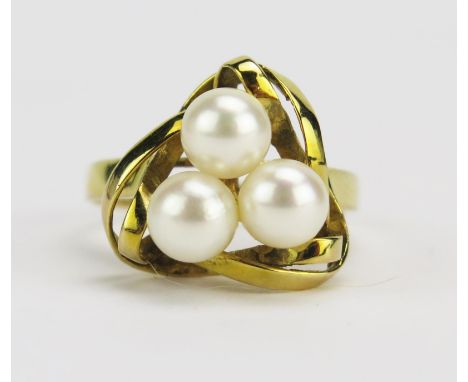A 14K Cultured Pearl Ring in a triangular entwined setting, 14.8mm head, size O, stamped `4K 585, 3.94g 