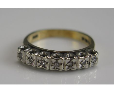 A 9ct Gold and Illusion Set Diamond Ring, size L.5, hallmarked, 2.76g 