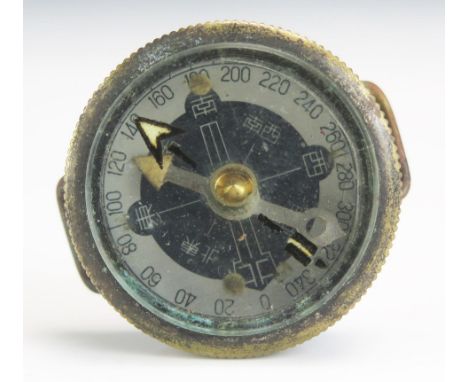 A world War II period Japanese officer's wrist compass, lacks strap. 