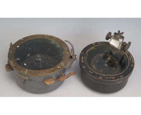 A World War II Hand bearing compass Type 06by H Hughes &amp; Sons, together with an Air Ministry compass 