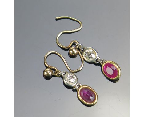 A Pair of Ruby and Diamond Pendant Earrings in a precious white and yellow metal setting, 1.38g 