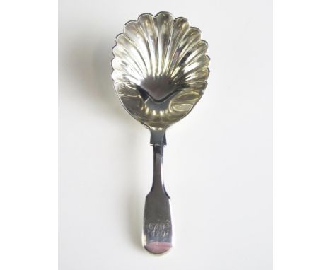 A provincial Victorian silver Fiddle pattern caddy spoon, maker Josiah Williams &amp; Co, Exeter, 1866, monogrammed, with she