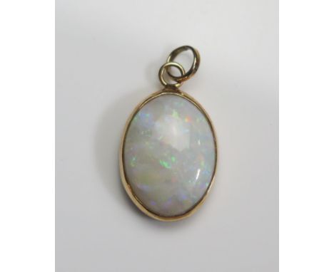 A 9ct Gold and Opal Pendant, 24.3mm drop, hallmarked, 2.11g 