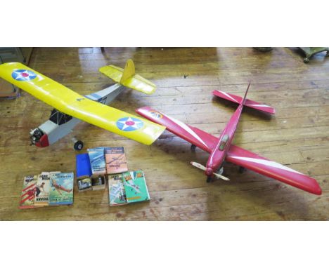 Model Aircraft group including 2 planes with engines, another loose engine and books a/f, (largest wingspan 137cm) 