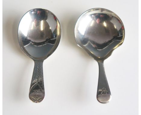 A George III silver Old English pattern caddy spoon, maker George Wintle, London, 1801, initialled, together with another Wil
