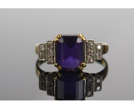 An 18K Gold, Amethyst and Diamond Ring, 8.5x6.9mm principal stone, size N.5, stamped 18K, 3.33g
