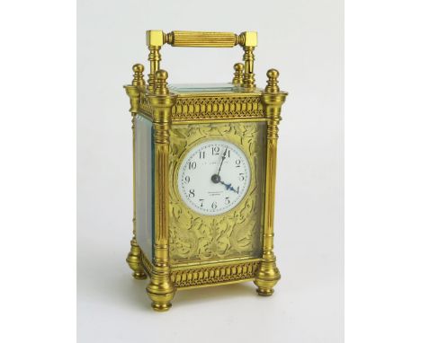 A 19th century French gilt brass carriage By Richard &amp; Co, with 4.5cm Arabic dial, within a cut brass guard, the movement