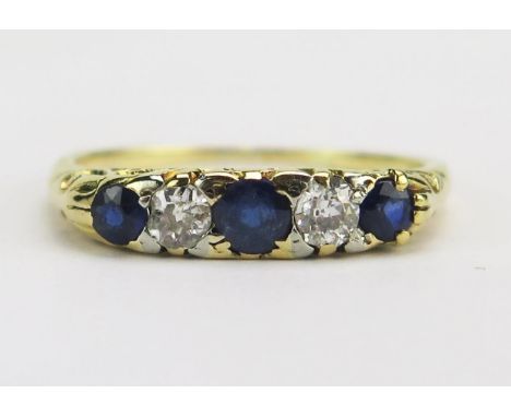 An 18ct Gold, Sapphire, Diamond and Paste Ring, size N.5, 2.74g 