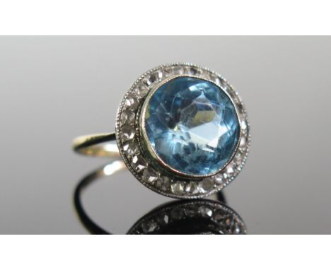 A Topaz and Rose Cut Diamond Ring in a precious yellow and white metal setting, c. 16.2mm head, size L.5, 5.33g 