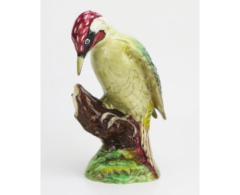A Beswick pottery model No 1218, of a Green Woodpecker, in gloss finish, 22cm high. 