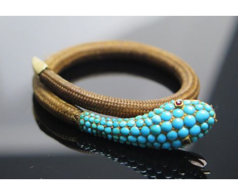 A 19th Century Precious Yellow Metal, Turquoise and Ruby Platted Hair Snake Bangle, 41.3mm head, KEE tests as 15ct, 22.44g.  