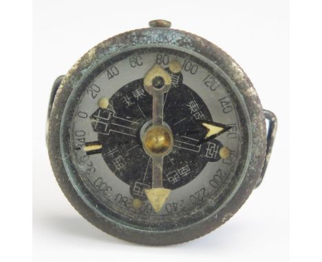 A world War II period Japanese officer's wrist compass, lacks strap. 