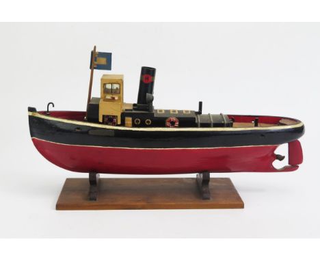 A Powered Wooden Model Pond Steam Boat with stand (41cm long) 