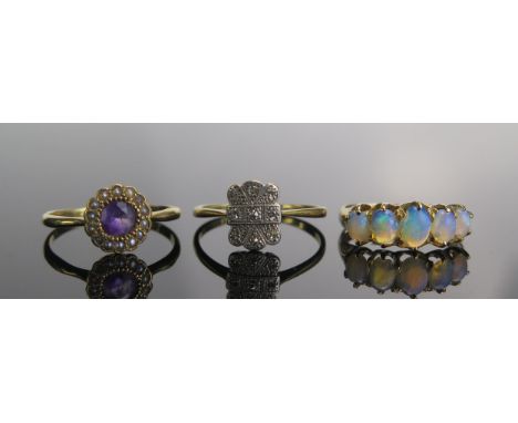 An Victorian 18ct Gold and Opal Five Stone Ring (5.9x4.4mm principal stone, size M.5, London 1898), an antique 18ct gold and 