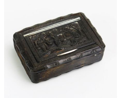 A late 19th century Chinese carved tortoiseshell snuff box, of rectangular outline, the hinged lid decorated with rural scene