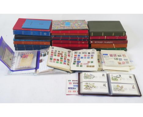 A Massive Collection of Stamps arranged in albums and loose including First Day Covers, stock books 