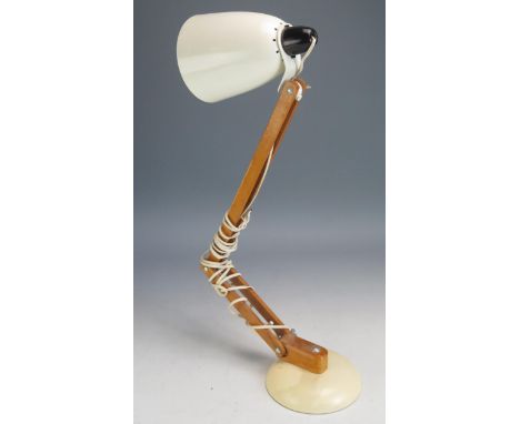 A Habitat style angle-poise lamp with pale cream shade and stand. 
