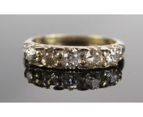 An 18ct Gold and Diamond Five Stone Ring, c. 3.5mm principal stone, size M.25, stamped 18CT, 2.73g 